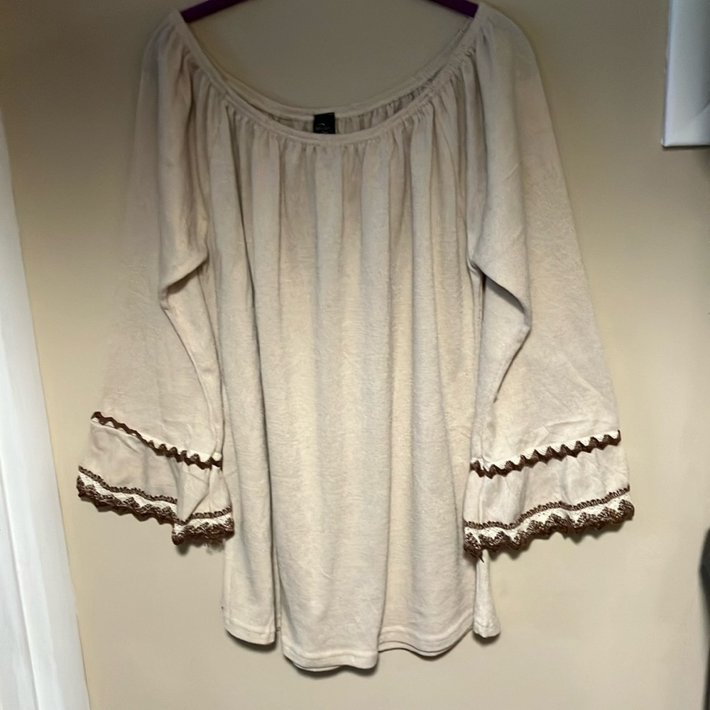 Win-win. Size extra large light tan tunic sweater.